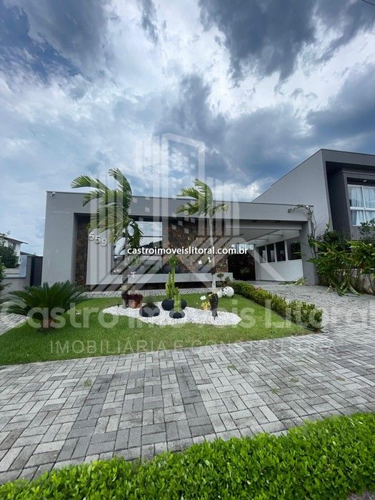 Casa em Condomínio Massaguaçu 4 dormitorios 3 vagas na garagem